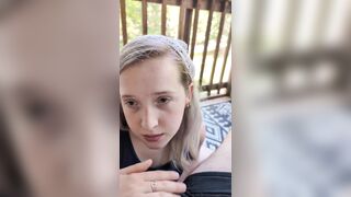Blond chick gives head on the patio