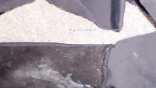 Cumming on ebony worn female strap