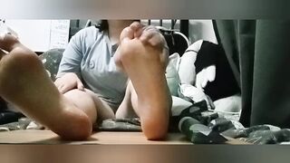 Trans male lubes up his feet