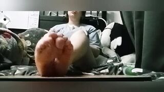 Trans male lubes up his feet