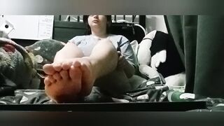 Trans male lubes up his feet