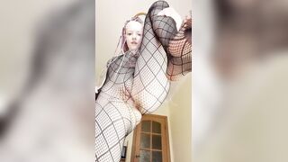 Thick legs widen wide in fishnet hosiery ?