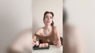 Eating sushi with my top off