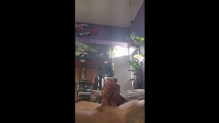 close up of large rod lubed up being stroked