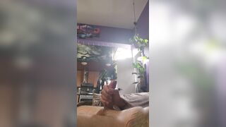 close up of large rod lubed up being stroked