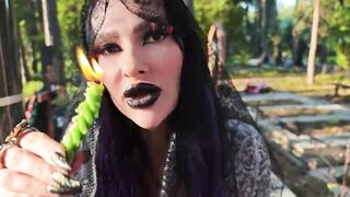 Gothic Witch Wanders the Cemetery, Performs Ebony Magic Rituals, and Makes U to Worship Her and Satan.