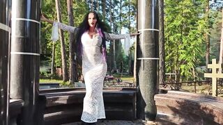 Gothic Witch Wanders the Cemetery, Performs Ebony Magic Rituals, and Makes U to Worship Her and Satan.