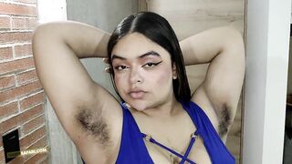 Hirsute Celeste in her blue suit