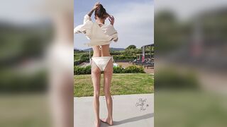 Disrobe tease in the Greek sunshine with Playful Charlotte Rose
