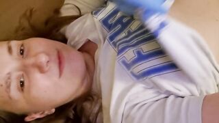 A beauty nurse in gloves bangs herself and shows her body