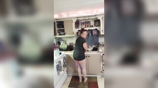 Business Woman Doing Her Duties Around The Abode After Work In Her Short Costume (PANTY TEASE)