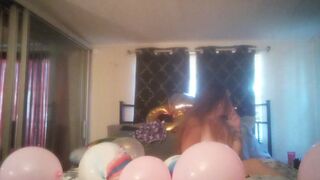 Incredibly excited gal takes off her costume and smokes cigarettes and pops balloons in nature's garb