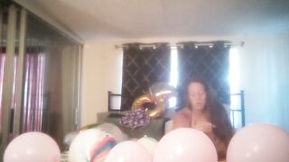 Incredibly excited gal takes off her costume and smokes cigarettes and pops balloons in nature's garb