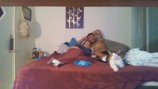 Pair smokin' and cuddling