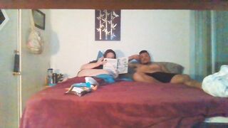 Pair smokin' and cuddling