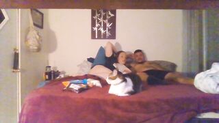 Pair smokin' and cuddling