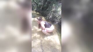Cute Lengthy Hair Hotty pulls down her jeans and pants and pees in popular spring creek