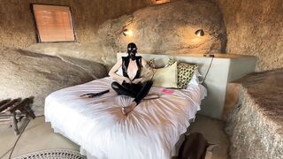 Masked Latex Bang Toy Masturbates in Africa
