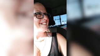 Nerdy angel with consummate breasts pulls her pants to the side and flashes her pink bald snatch