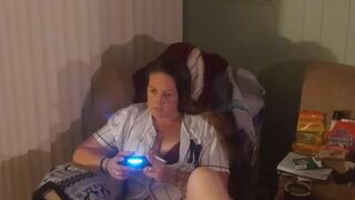 Gorgeous white hotty in brassiere and pants playing vids games gets lewd and craves sex