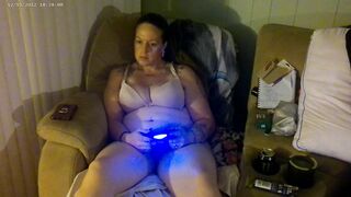 Step Mommy smokin' and playing movie scene games in her brassiere and pants