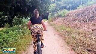 A large-assed woman in taut leggings rides a bike throughout the woods and ends up giving head and getting drilled outdoors with her biggest butt