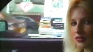 Large boobed blond gives oral in car