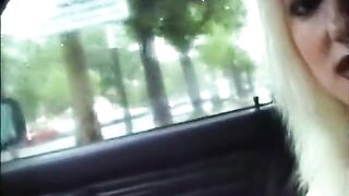 Large boobed blond gives oral in car
