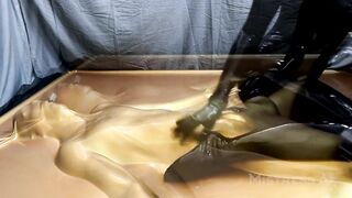 Latex Lovers Encased in Gold