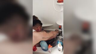 Charming gal gives kitten a washroom