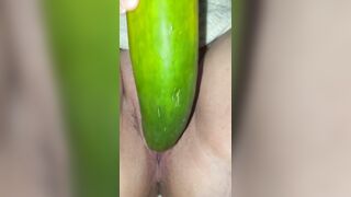 Bitch rubs cucumber against her twat and then makes it for dinner