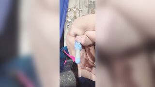 What Is That Bitch Sticking in Her Booty? Is That a Toy That babe Had in the Past?