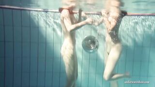 Mia and Petra strip eachother in the swimmingpool