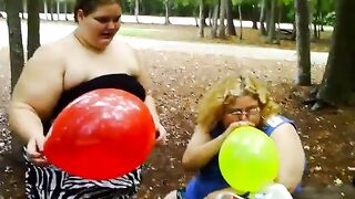 two bbws are balloon blowing and popping