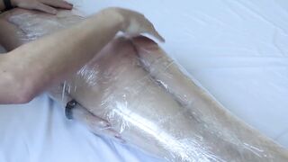 Cute Transsexual wrapped in plastic! Thrashing! Spunk fountain in her throat! Used til this babe cums!