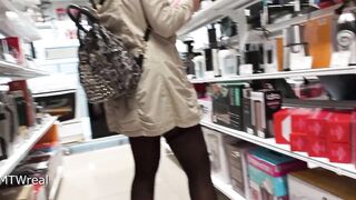 in a short petticoat and nylons out of underclothes in the store