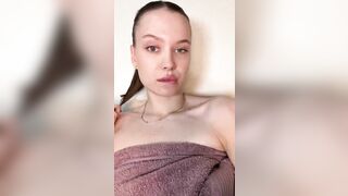 Bare shoulders teasing with towel barely holding ?