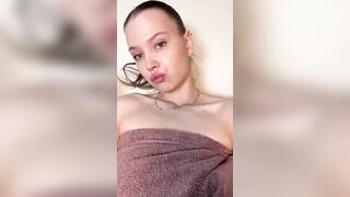 Bare shoulders teasing with towel barely holding ?