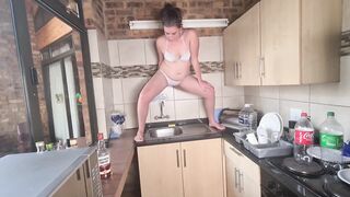 Beauty pissing in the sink of a holiday resort