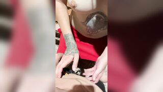 An Oriental woman performs oral job-job on a groaning stud outdoors.