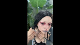 Tattooed angel teases with collar and lips ?