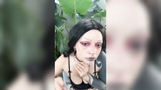 Tattooed angel teases with collar and lips ?