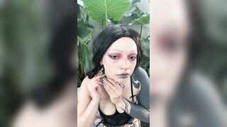 Tattooed angel teases with collar and lips ?