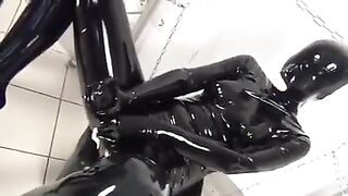 2 lesbian mastubed in latex catsuit with stapo