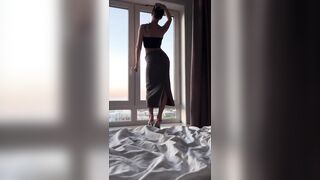 stretching high heels ans lengthy constricted petticoat