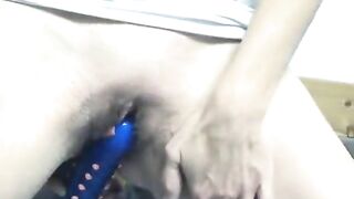 Brunette hair with bald twat gets herself off with sex toy