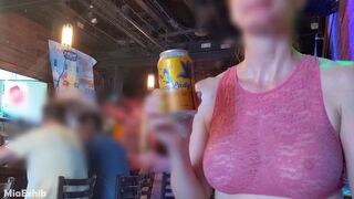 Sheer top in public (street, store, bar)