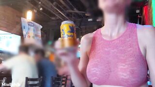 Sheer top in public (street, store, bar)