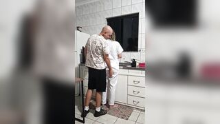The maid got banged in the butt in the kitchen whilst washing the dishes.