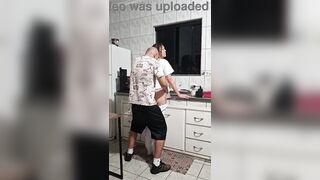 The maid got banged in the butt in the kitchen whilst washing the dishes.